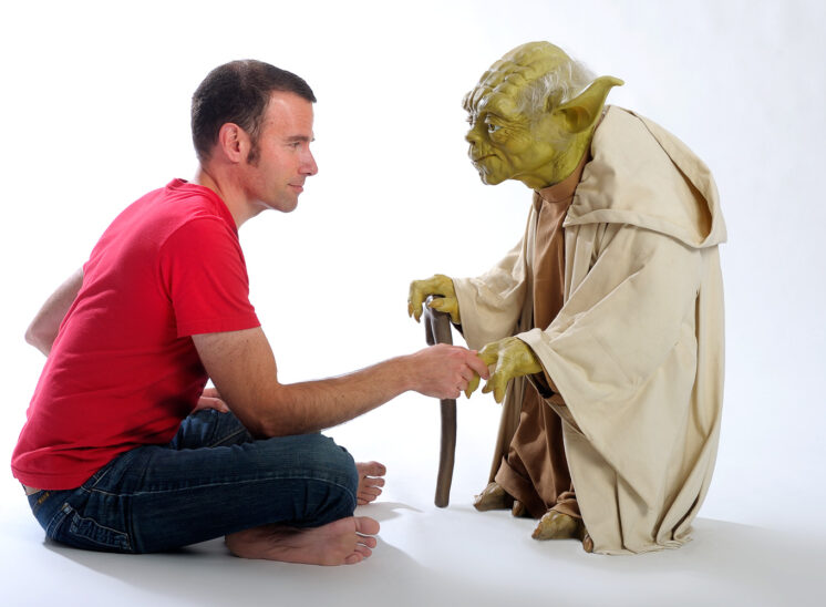 Arik Korman (former Program Manager for The Bob Rivers Show) absorbing wisdom from Master Yoda