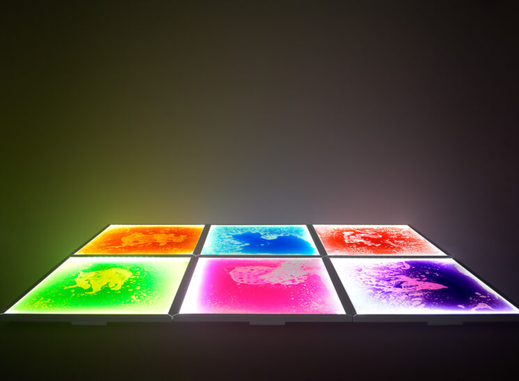 From Playlearn: A group of pressure sensitive, interactive and glowing, colorful, squishy floor tiles. Jerry and Lois Photography