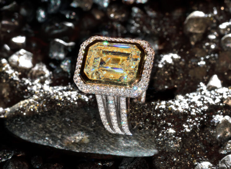 From a series shot with a custom-built, proprietary lighting system designed to capture the inner fire, fine jewelry sparkles for the camera. In this shot, an amazing very large yellow-fancy diamond ring and surrounding diamonds. Jerry and Lois Photography