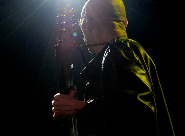 Bassist virtuoso, Tony Levin, (Peter Gabriel, King Crimson, John Lennon, Paul Simon...) in fantastic stage lighting. Jerry and Lois Photography